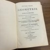 Nouveau traité de géométrie et de trigonométrie rectiligne et sphérique, suivi du Toisé des surfaces et des volumes et accompagné de tables de logarithmes des nombres et sinus, etc., naturels et logarithmiques et d'autres tables utiles : ouvrage théorique et pratique illustré de plus de 600 vignettes, avec un grand nombre d'exemples et de problèmes à l'usage des arpenteurs, architectes, ingénieurs, professeurs et élèves, etc. /